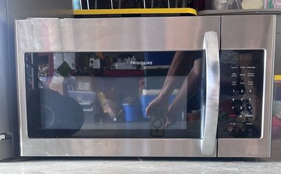 Frigidaire Stainless Steel Over-the-Range Microwave 2 year old practically new