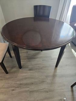 Round Dark Wood Extendable Dining Table