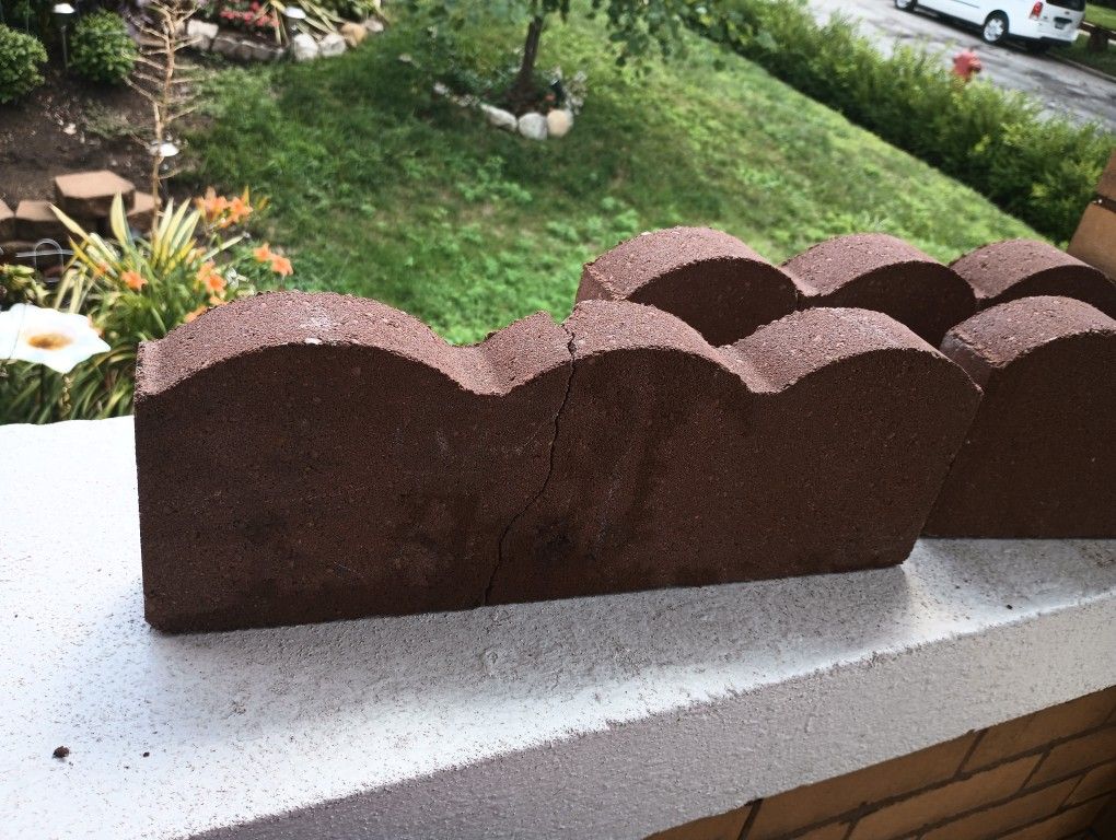 Three Garden Surround Decorative Bricks. Rustic Color Brown. 15 And Three Fourth Inches Wide By 5 And One Half Inches Tall.