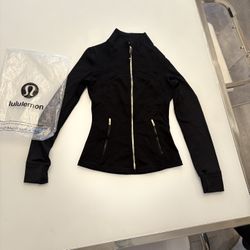 Lululemon Women's DefiJacket, Size 2 and 4, black and gold, Brand New.
