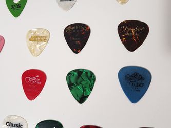 24 Assorted Guitar Picks & Cases
