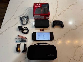 Nintendo Switch 2 + Games + Accessories