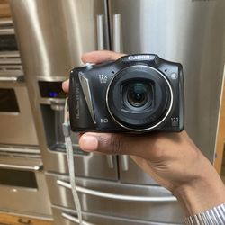 Canon Powershot SX130 IS digital camera with 12MP, 12x zoom lens Super clean