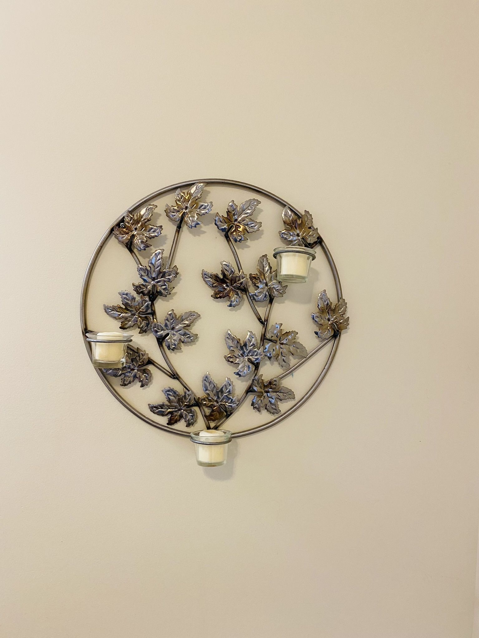 Antique high quality metal ornament with 3 candles. Designer hand made. Like new. Hang it on the wall and enjoy. Ring is 15.5” in diameter. Swinging c