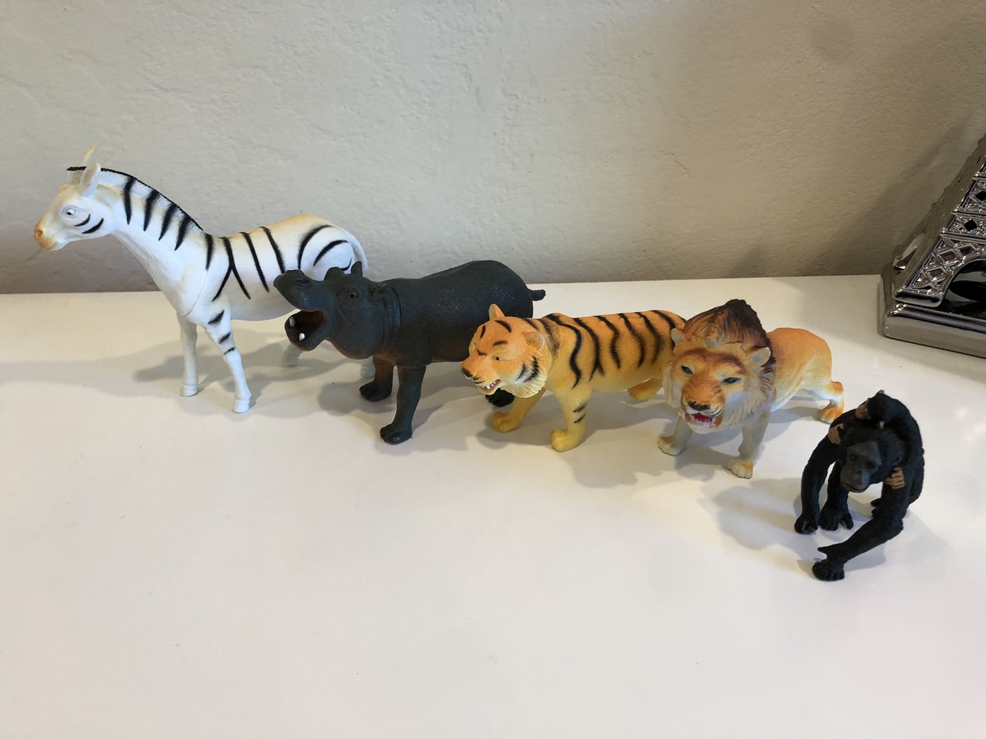 A lot of medium size zoo animals zebra, hippo, tiger, lion, monkeys toys $10 for all