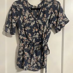 Women’s blue floral blouse