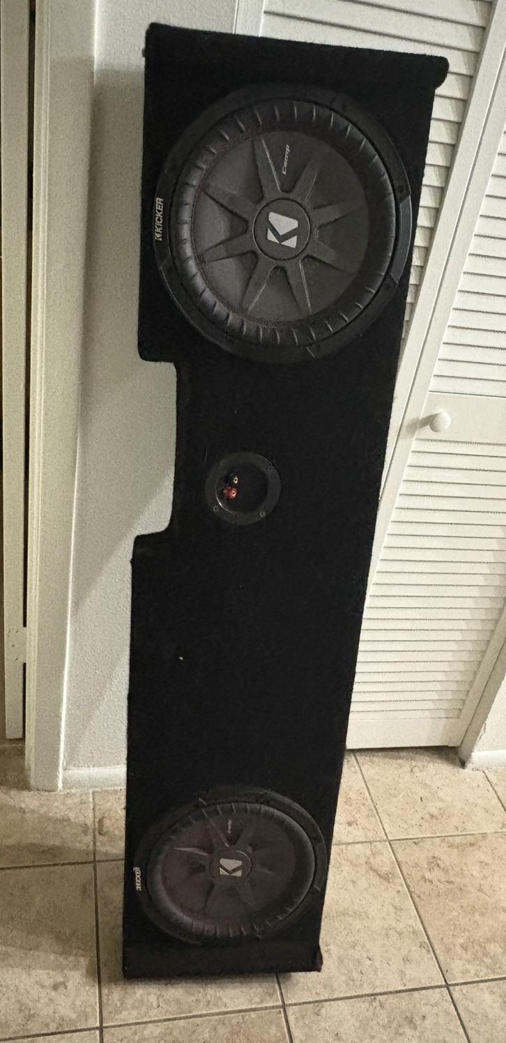 Low Profile Dual Kicker CompRT 12 Inch Subs W/ Box. Please be local.