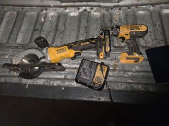 Dealt saw battery charger and drill