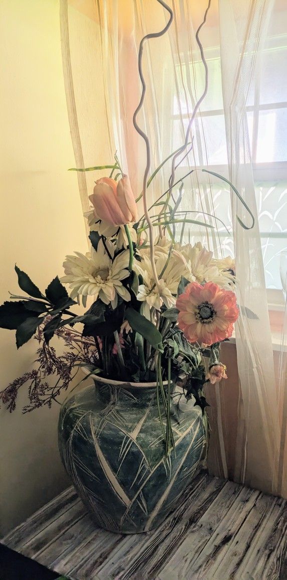 Clay Vase With Flowers