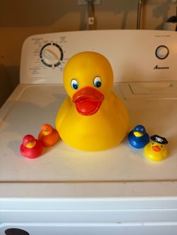 Giant rubber, ducky, and four little rubber duckies