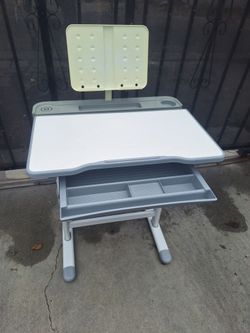 Adjustable student desk table