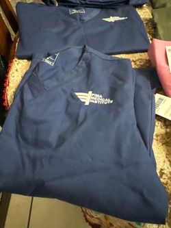 Blue nurse scrubs on sale now