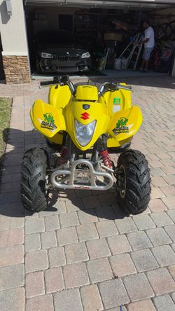 Suzuki ATV Four Wheeler Yellow