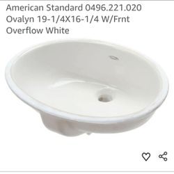 3915: New American Standard 0496.221.020 Ovalyn 19-1/4X16-1/4 W/Frnt Overflow White