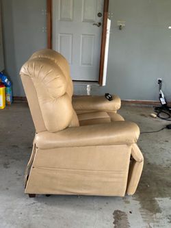 Beige/gold Recliner w/remote control.