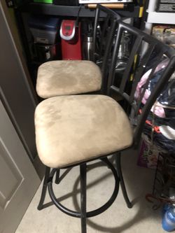Two swivel barstool chairs
