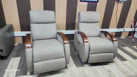 recliners resemble the LUXEYARD Gray Boucle Fabric Swivel Glider Reclining Chair with brown wooden arms