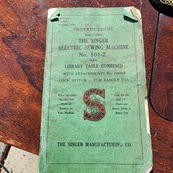 Singer Sewing Machine And Cabinet 