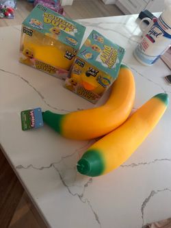 Banana squishie from target and big squishie duck from five and bellow 15 $ each