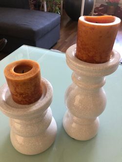 Two porcelain/ white candle holders