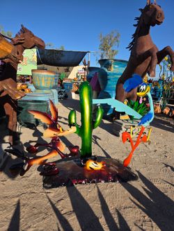 Desert's Hidden Gems🌵🌷Metal yard art , PLANTERS