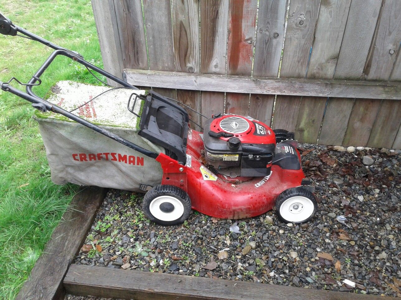 Craftsman 6.75 horsepower lawn mower and M light weed eater