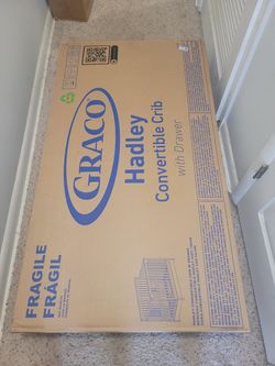 Graco 5-in-1 convertible crib and mattress