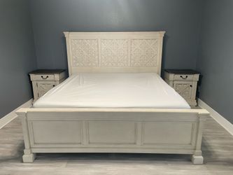 Ashley’s long size bed frame and nightstands (2)