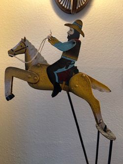 VINTAGE 20TH CENTURY PAINTED METAL PENDULUM COWBOY & HORSE ROCKING FIGURE