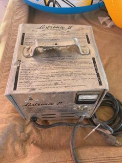 Charger For A Walk Behind Scrubber 