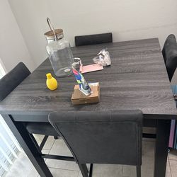 Ashley Furniture dining table and 4 chairs