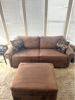Sleeper loveseat and storage ottoman