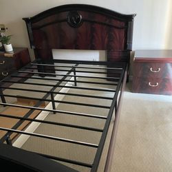 Queen size bed, two night stands, one dresser, and one mirror.