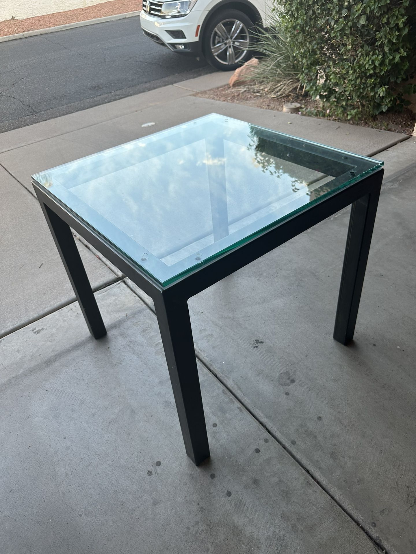 Parsons end table with glass top in Excellent condition.
