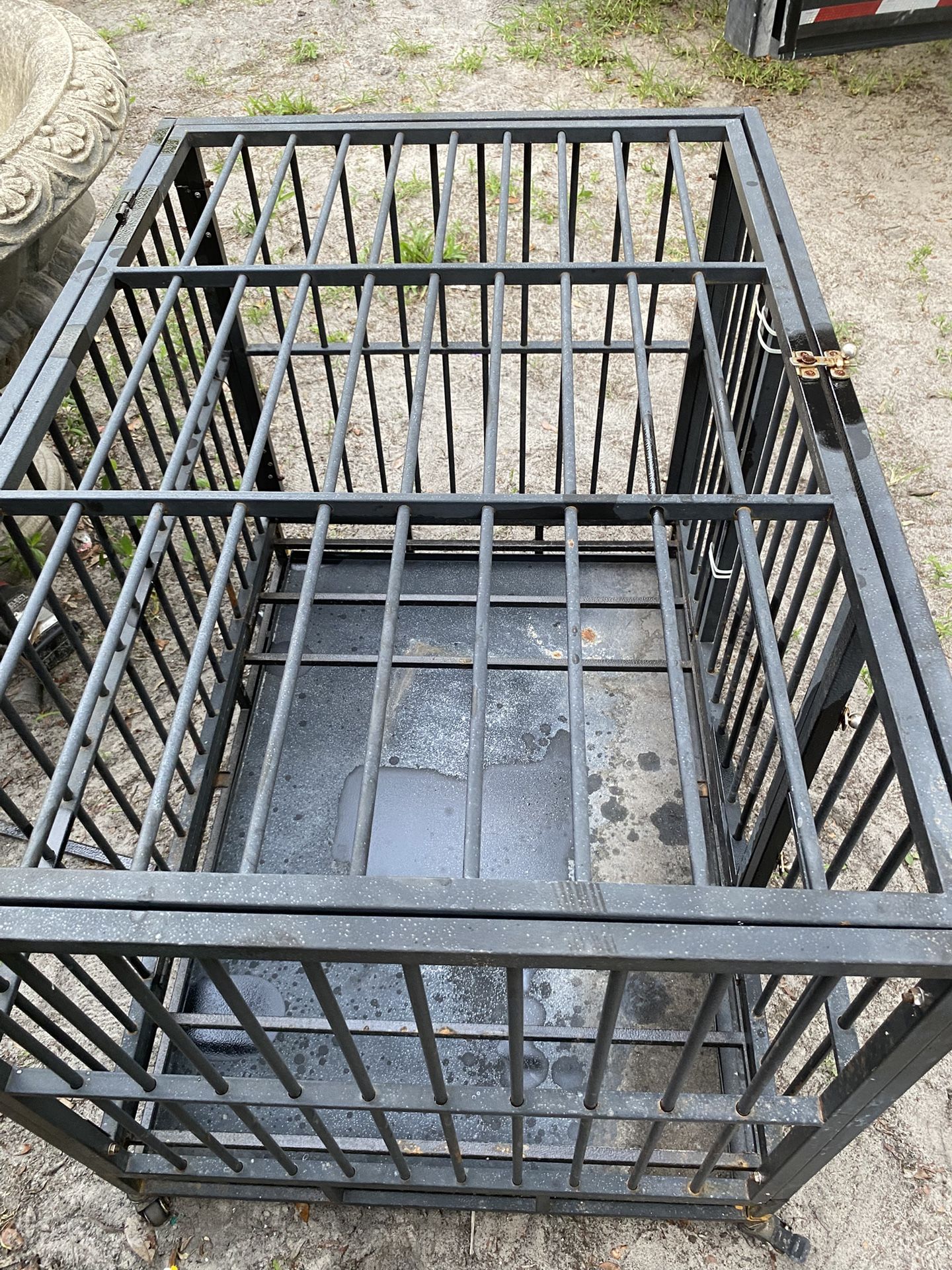 I Heavy duty dog cage got wheels to. 34 tall , 43long , 30 wide $85 Located Mount Dora Fla 32757