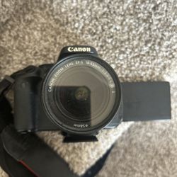 Canon EOS Rebel T5i Digital SLR with EF-S 18-55mm is STM Lens - Wi-Fi Enabled