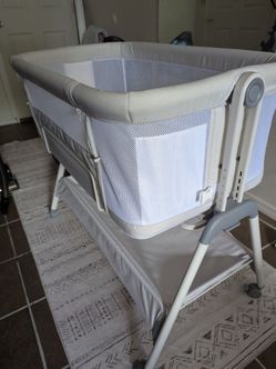 Flat Bedside Bassinet with Storage Basket, Easy Folding Portable Crib with Wheels