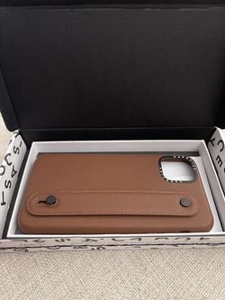 Casetify IPhone 11 Pro Max Leather case with strap to hold comfortably and acts as a phone stand. You can customize with charms (not included)  - NEW 