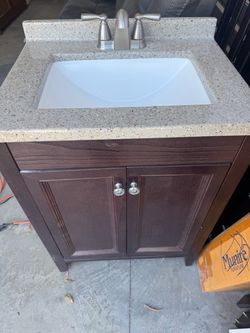 Delridge 25 in. Single Sink Chocolate Freestanding Bath Vanity with Caramel Cultured Marble Top $200