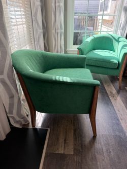 Two New Robsjohn-Gibbings style lounge chairs.