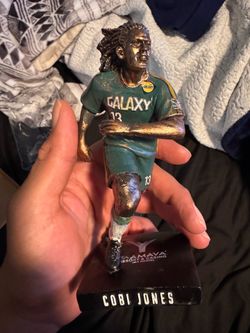 Cobi Jones mini statue