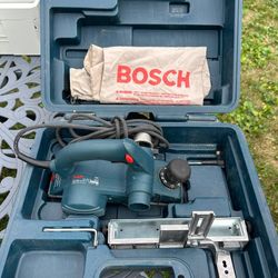 Bosch. 6.5 Amp 3-1/4 in. Corded Planer Kit with 2 Reversible Woodrazor Micrograin Carbide Blades and Carrying Case
