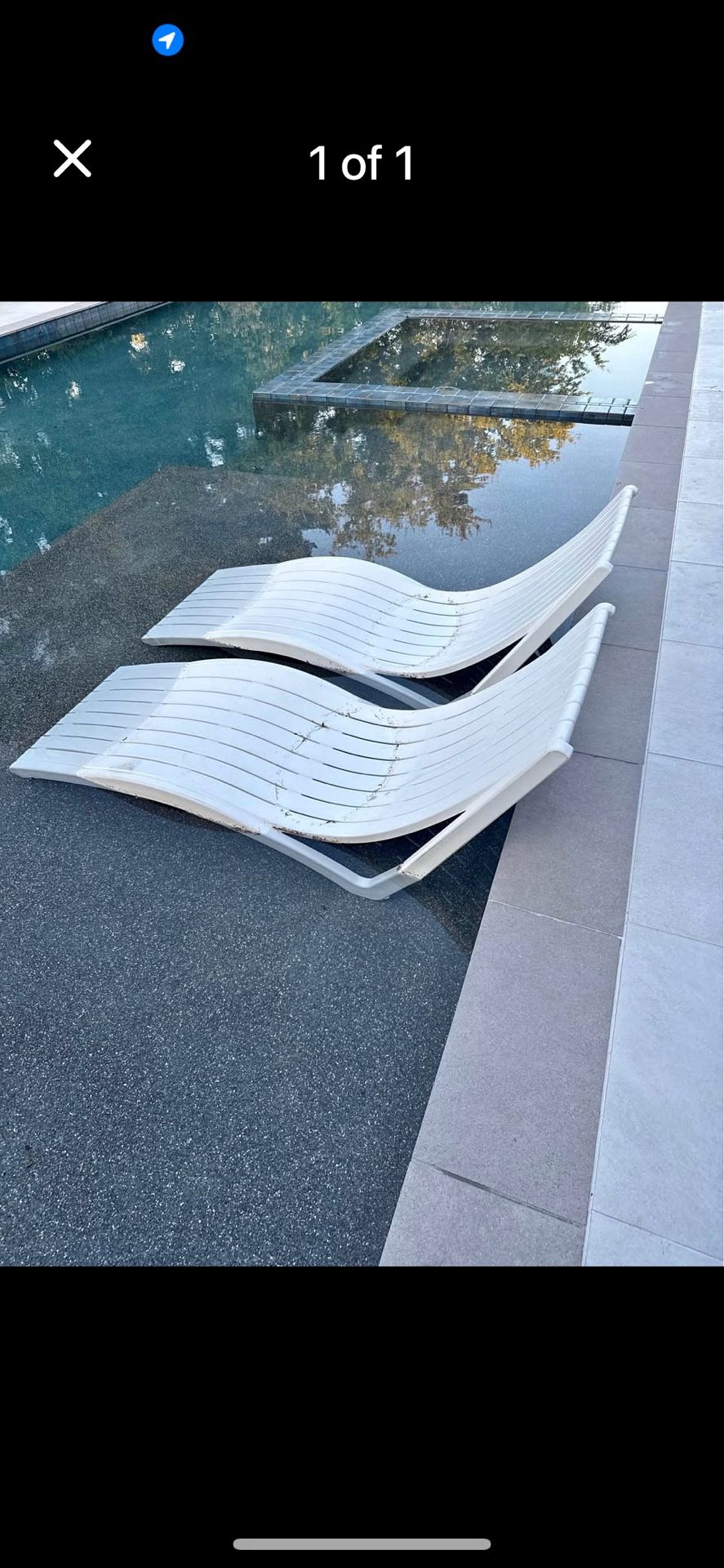 A Set Of Pool Ledge Loungers