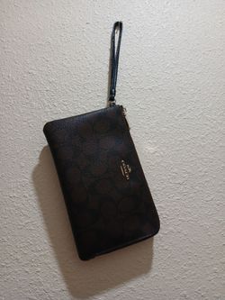 Coach double zipper wallet it need some some stitching