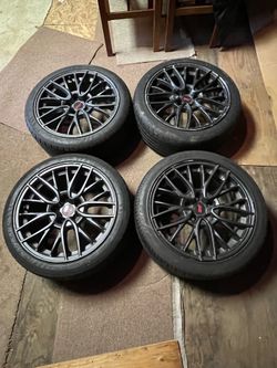 Subaru STI OEM rims with tires