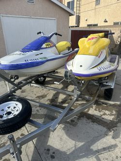 2 Running Jet Skis And Trailer