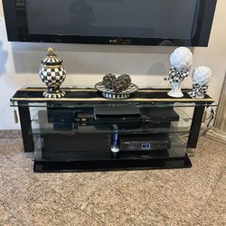 Under TV stand 