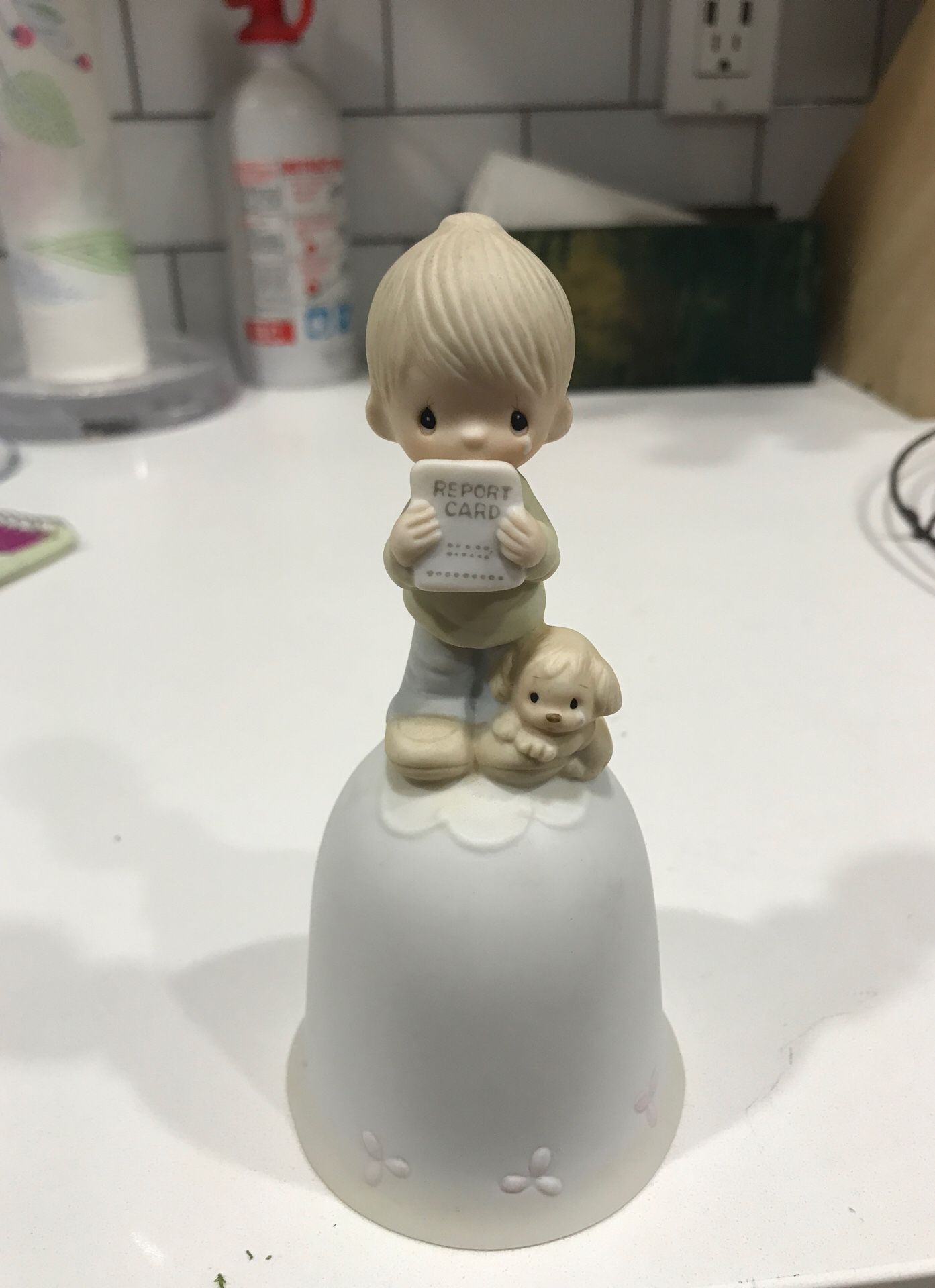 Precious Moments bell entitled “God Understands”, featuring boy with report card and dog, 5 1/2” tall, porcelain, cash only, no box