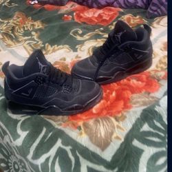 Black Cat Jordan 4s