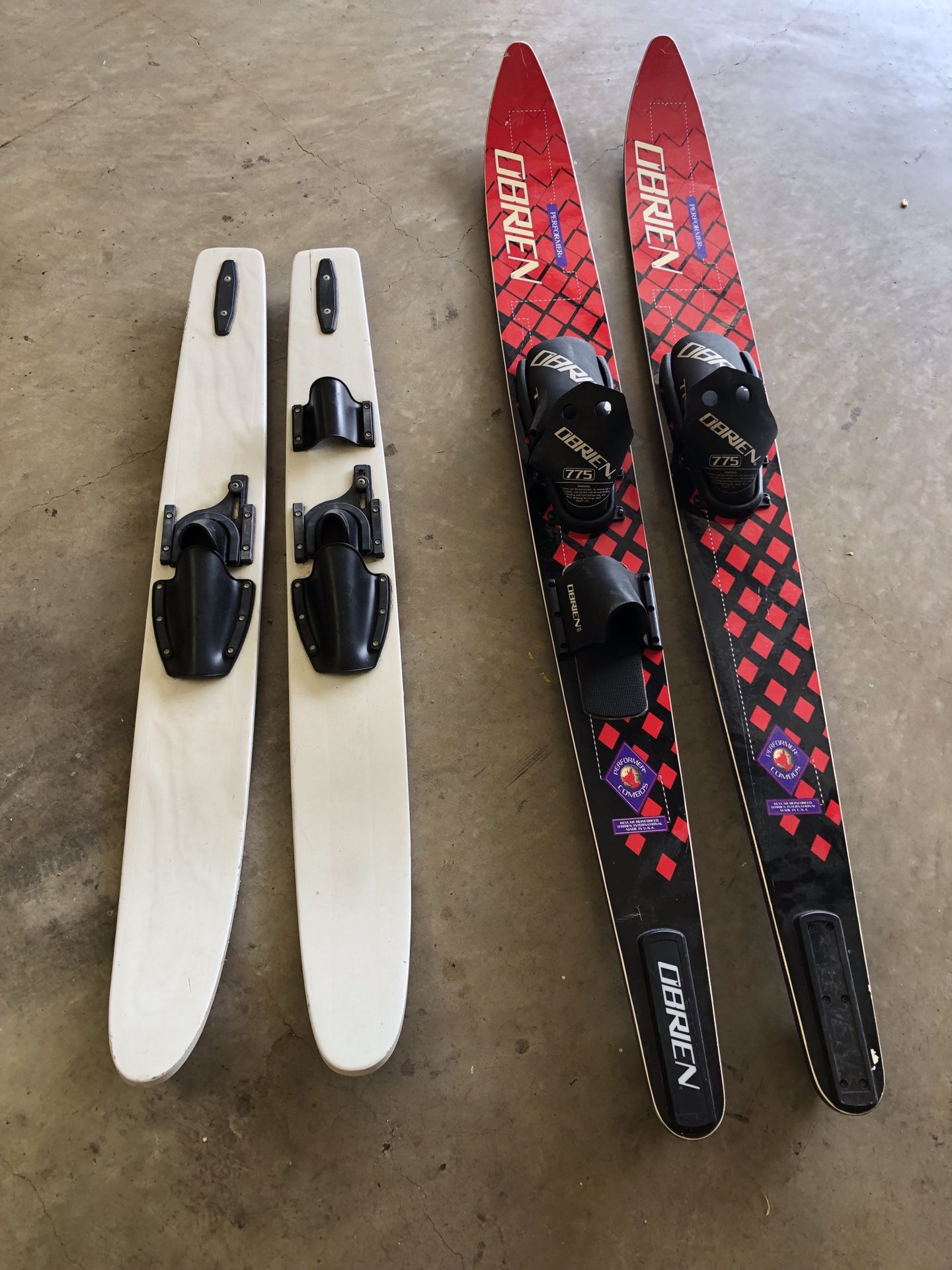 Pair of O’Brien water skis and a pair of children trainer skis